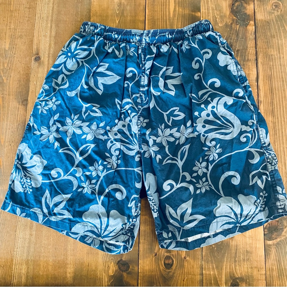 Blue Hawaiian print swim trunks